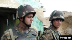 Armenian soldiers at a front-line position east of Karabakh