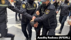 At least 20 demonstrators were detained by officers during the December 15 rally in Baku.