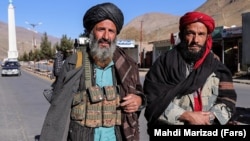 Taliban soldiers patrolling a street in Panjshir on December 9.