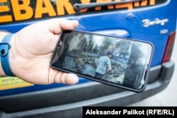 Borsuk shows a photo of a bombed street in Bakhmut, a city in the Donbas.