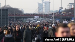 Protesters block traffic on a highway in Belgrade on December 4.