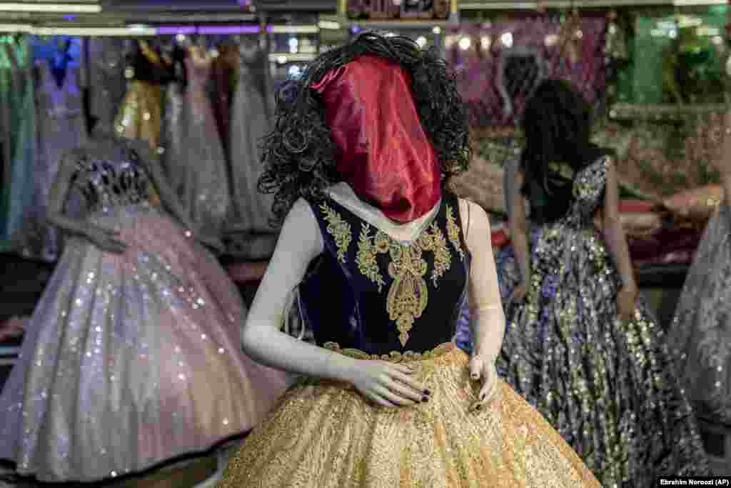 Hooded shop mannequins have become a symbol of Taliban rule in Afghanistan, as seen in this December 2022 photo. The Taliban initially said mannequins must be either removed or beheaded, but after shopkeepers complained, they agreed on this bizarre compromise.