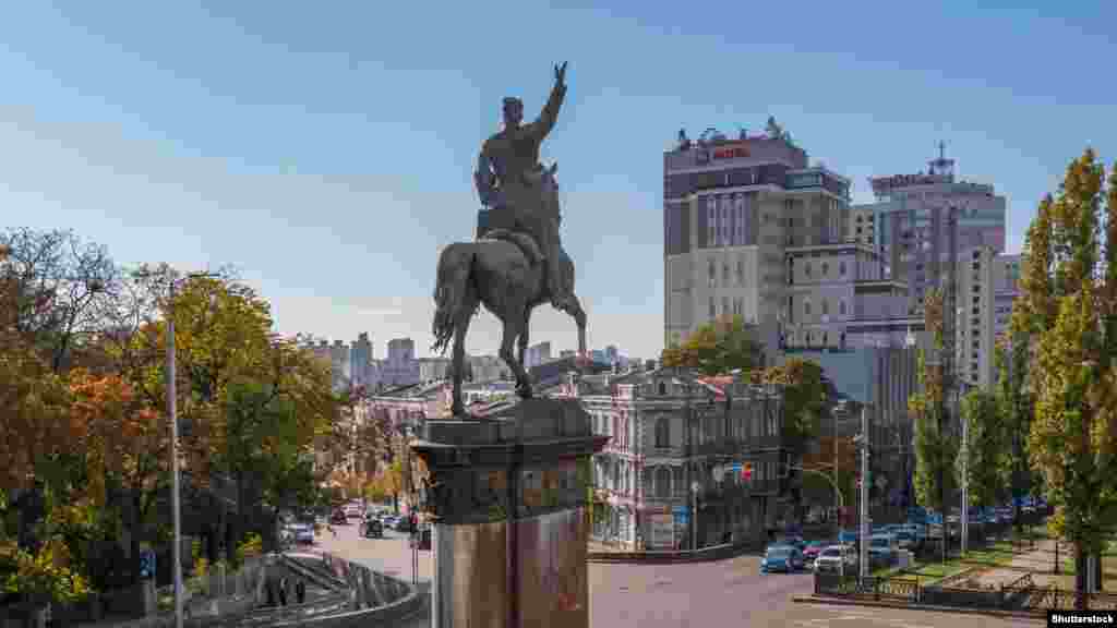 A monument to tsarist, then Red Army, military commander Nikolai Shchors in central Kyiv. The monument was repeatedly vandalized before being taken down on December 9, 2023. In this October 2021 photo, the horse&rsquo;s replacement front leg can be seen after the original bronze limb was sawn off by unknown activists. &nbsp;