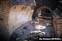 A window inside the ruined church