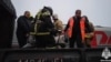 Rescue team work to evacuate passengers from the Vorkuta-Novorossiisk train on June 26.