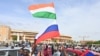 Supporters of Niger's coup wave Nigerien and Russian flags as they demonstrate in Niamey in August. 