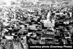 An archival photo of the Church of the Red Gospel (right) before its 1989 collapse