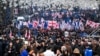 Georgians march to celebrate their country's European Union candidate status in Tbilisi on December 15. 