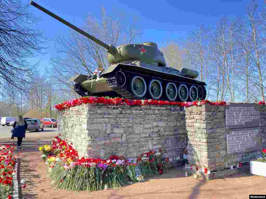 A Soviet T-34/85 Tank in Narva, Estonia, on the border with Russia that marked the 1944 capture of Narva from Nazi forces, photographed in May 2022. The tank was hauled off its plinth and taken to a local museum in August 2022. In response to the controversial removal of the tank, Russian authorities installed a&nbsp;nearly identical monument&nbsp;in Ivangorod, just across the river border with Estonia, one month later. &nbsp;