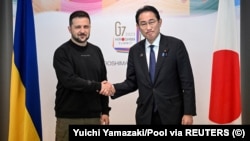 JAPAN – President of Ukraine Volodymyr Zelenskyy and Japan's Prime Minister Fumio Kishida (R) during their bilateral meeting following the conclusion of the G7 Summit Leaders' Meeting in Hiroshima, Japan, May 21, 2023