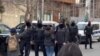 Police in the Azerbaijani capital, Baku, during a raid of the Toplum TV offices on March 6.