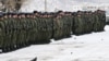 Russian soldiers attend a ceremony marking the end of combat training for mobilized men in the Eastern Military District on October 31.