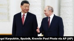 Russian President Vladimir Putin (right) with his Chinese counterpart, Xi Jinping, in Moscow last year. 