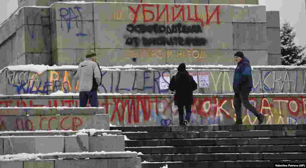 Graffiti, including the word &ldquo;killers&rdquo; in English and Bulgarian, covers the monument on February 28, 2022. Debate over whether to demolish the monument has raged for years.