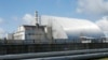 A shelter construction covers the exploded reactor at the Chernobyl nuclear plant.