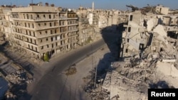 Damaged buildings in a rebel-held area of Aleppo