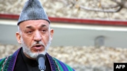 Afghan President Hamid Karzai ruled out negotiations with the Taliban until the insurgent group had an address.