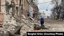 Vladimir Putin has turned back the clock in his own country by decades -- and, with an onslaught that the deputy mayor of Mariupol (pictured after recent shelling) called "medieval," seems intent on casting Ukraine back several centuries.