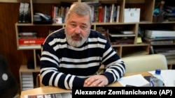 Novaya gazeta Editor in Chief Dmitry Muratov speaks with the Associated Press at the newspaper's offices in Moscow on October 7.