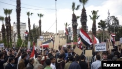 Syrian pro-reform protesters in the town of Douma