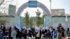 Girls leave their school in Kabul after the Taliban ordered it closed, just hours after it reopened on March 23.