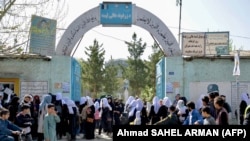 Girls leave their school in Kabul after the Taliban ordered it closed, just hours after it reopened on March 23.