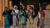 Taliban fighters stand guard outside a mosque during Eid al-Fitr prayers in Kabul on May 1.