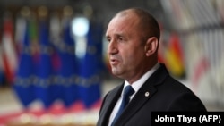 Bulgarian President Rumen Radev addresses the media as he arrives for an EU summit in Brussels on June 24.