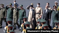 Iranian Supreme Leader Ayatollah Ali Khamenei (center) attends an armed forces graduation ceremony on October 3 amid ongoing anti-government protests in the country. 