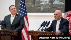 Afghan President Ashraf Ghani (right) and U.S. Secretary of State Mike Pompeo (file photo)