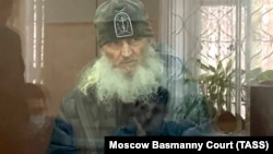 Father Sergy (aka Nikolai Romanov), an ultraconservative, coronavirus-denying Russian priest who was stripped of his religious rank, attends a court hearing in Moscow in 2021. 