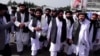 Members of the Taliban leadership walk in Kabul after the militants took control of the capital in August 2021.