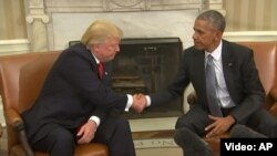 U.S. President Barack Obama (right) said President-elect Donald Trump must "respect" U.S. institutions and warned that there was a difference between governing and campaigning.