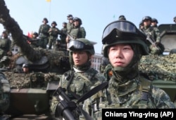 Taiwanese soldiers during military exercises as part of their country's efforts to show its determination to defend itself from Chinese threats. (file photo)