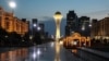 At the top of Bayterek, the observation tower serving as a centerpiece for a city dotted with lavish, eyebrow-raising architecture, visitors are invited to place their hand in a golden Nazarbaev handprint as they look out over the city.    