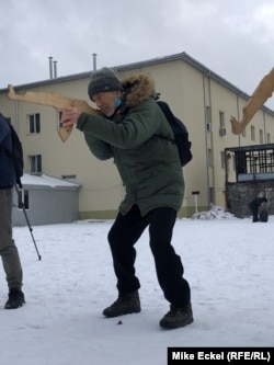 With Russian threats looming, civil-defense training is exploding in popularity in Ukraine. Some of the training involves using wooden cutouts to simulate rifles.