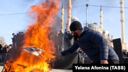 Supporters of Chechen leader Ramzan Kadyrov hold a tumultuous protest in central Grozny on February 2 to denounce human rights lawyer Abubakar Yangulbayev and his family. 