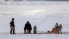 A tea-seller braves the cold amid freezing temperatures in Kabul. 