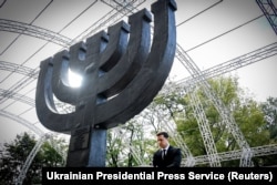 Ukrainian President Volodymyr Zelenskiy takes part in a commemoration ceremony for the victims of Babyn Yar, one of the biggest single massacres of Jews during the Holocaust, in Kyiv on September 29, 2021.