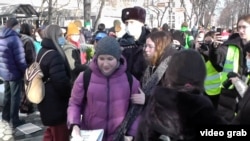 Anti-war protesters are detained in Yekaterinburg on February 26. The Kremlin said it needed a "harsh" new law to tackle such reports due to the current "information war."