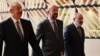 Azerbaijani President Ilham Aliyev (left) and Armenian Prime Minister Nikol Pashinian (right) walk with EU Council President Charles Michel on August 31, 2022.