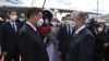 Kazakh President Qasym-Zhomart Toqaev (left) greets his Chinese counterpart, Xi Jinping, upon the latter's arrival in Nur-Sultan on September 14. 