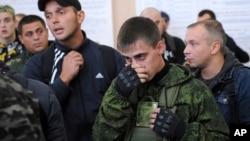 Russian recruits gather inside a military recruitment center in the Rostov-on-Don region in 2022.