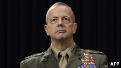 U.S. General John Allen looks on following a meeting of NATO defense ministers at NATO headquarters in Brussels in early October.