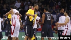 U.S. and Iranian national basketball players congratulate each other following their game at FIBA's world championships in Istanbul on September 1.