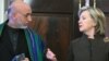 U.S. Secretary of State Hillary Clinton and Afghan President Hamid Karzai at the U.S. State Department on May 11