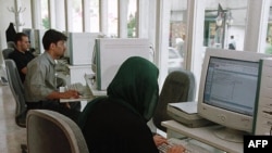 Surfing the Internet at a cafe in Tehran