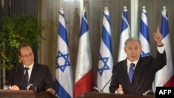 French President Francois Hollande with Israeli Prime Minister Benjamin Netanyahu during a joint press conference in Jerusalem on November 17.