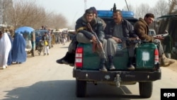 An Afghan police patrol in Konduz Province (file photo)