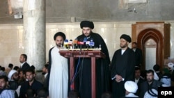 Muqtada al-Sadr speaks during Friday Prayers at the Al-Kufah Mosque in Al-Najaf in 2006.